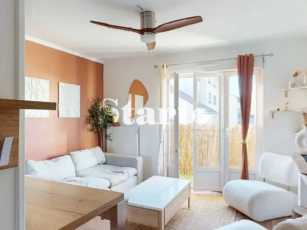 Appartement avec balcon et garage proche centre-ville