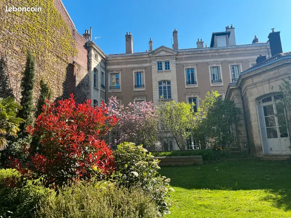 Hyper centre, superbe appartement familial haussmanien en TBE, jardin, parking