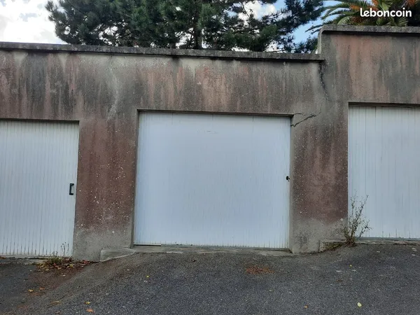 Garage 16m2 et place de stationnement