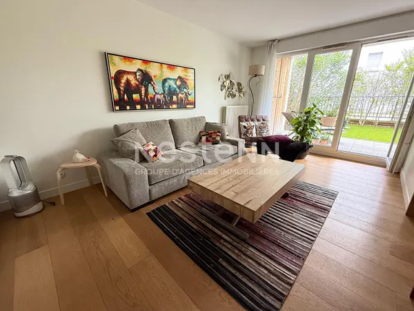 Appartement 2P de 44.51 m2 avec terrasse et jardin, cave et parking