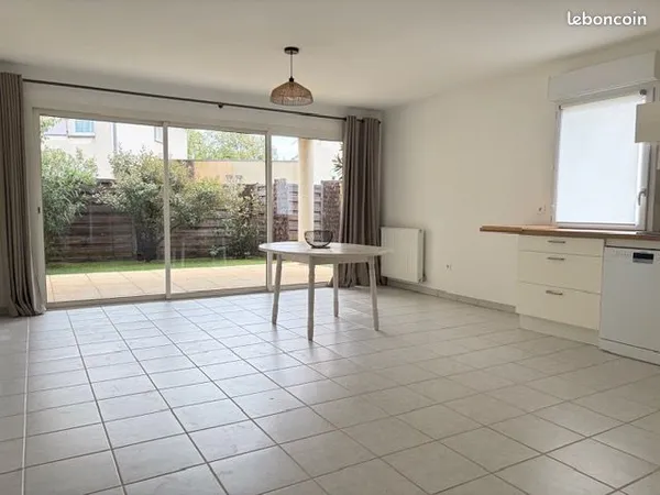 Appartement t3 65m2 avec garage et jardin
