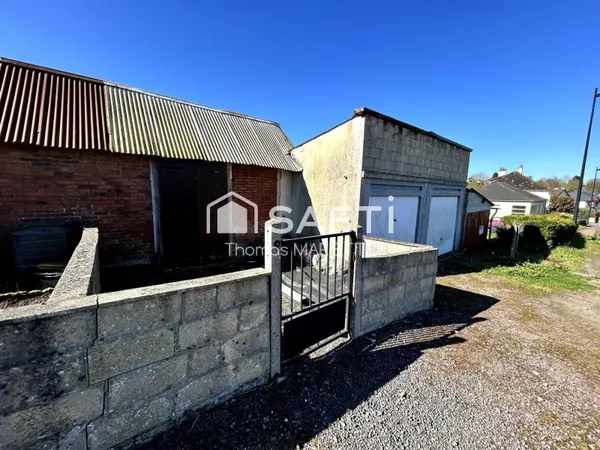 Garage avec cave, remise et terrasse