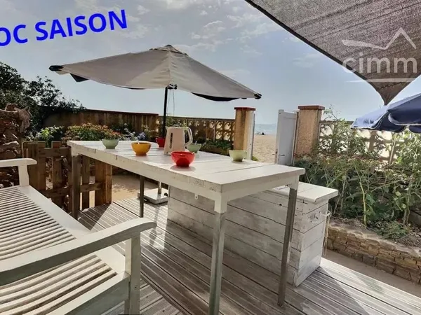 Maison les pieds dans le sable