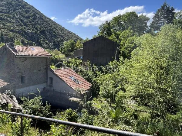MaisonT4 de 110 M2 de caractère dans un ancien moulin sur une parcelle de 987M2 Ferrals-les-Montagne
