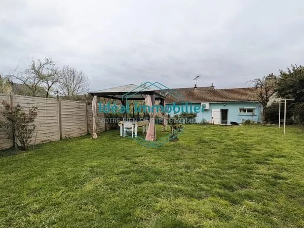Charmante maison avec jardin et garages