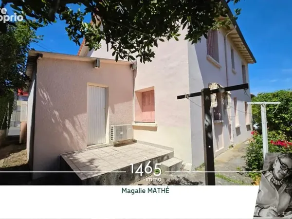 Maison des années 50 divisée en deux lots, en monopropriété, avec jardin, garage - Vallières