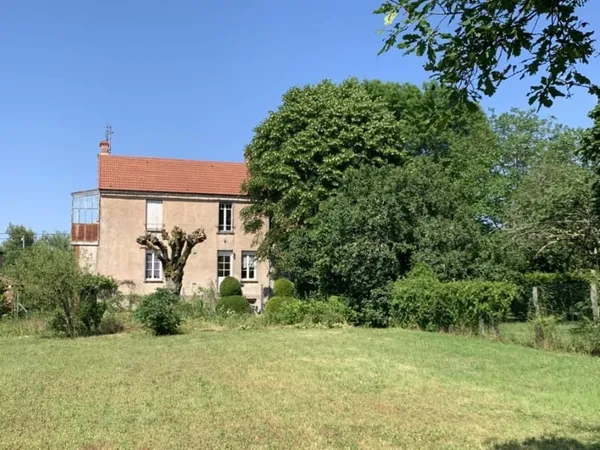 Maison ancienne sur 2 niveaux avec 2 appartements