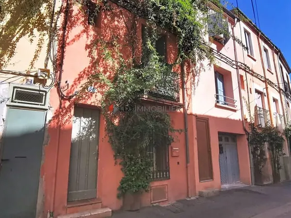 Immeuble de trois lots déja loués