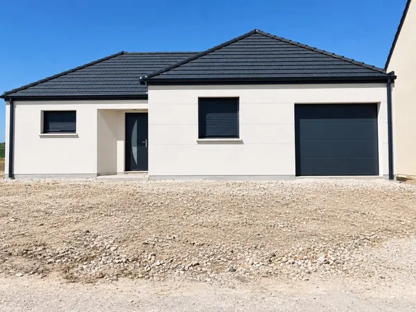 Maison plain pied en L avec garage et 3 chambres