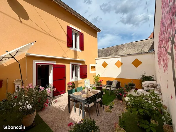 Maison centre-ville avec garage et magnifique terrasse 4 pièces 70m2