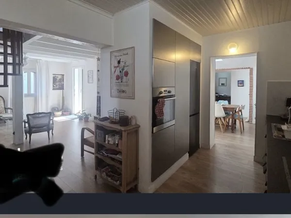Maison avec jardin au centre ville