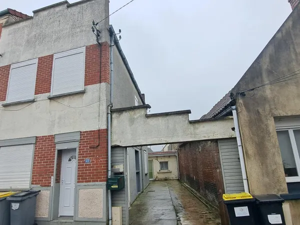 Lot de 2 maisons dont une louée et une libre d'occupation
