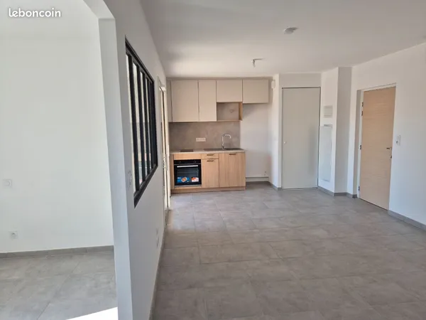Studio neuf avec balcon-terrasse de 9 m² et parking