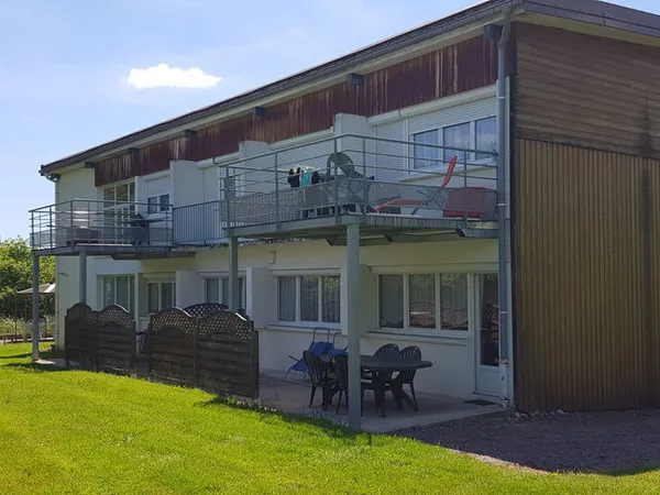Immeuble de 9 logements avec terrain à Bains-les-Bains Investissement locatif clé en main