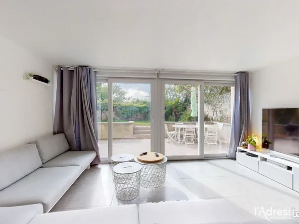 Appartement 107 m² rez-de-jardin - terrasse + jardin 100m²