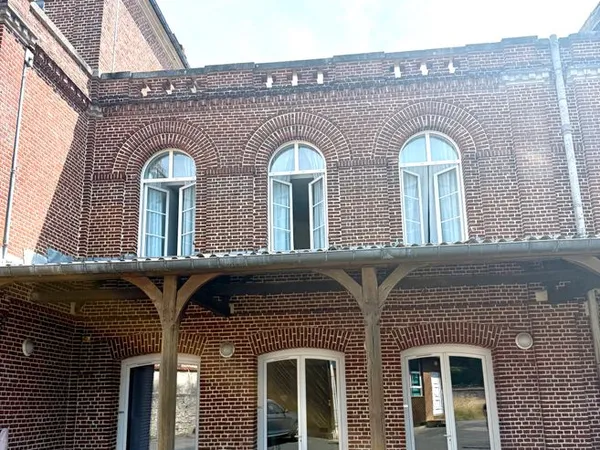 Location appartement T2 rdc avec parking centre ville Noailles