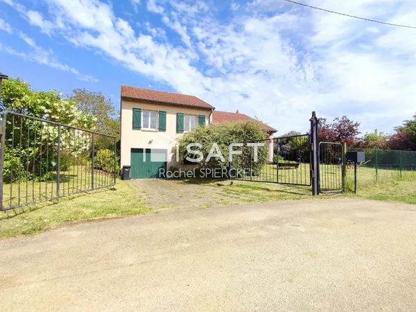 Maison individuelle sur demi niveau avec garage et grand jardin
