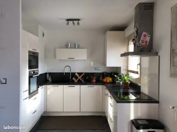 Appartement 50m2 avec balcon place de parking et cellier
