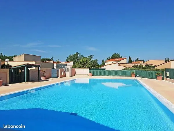 Studio cabine T2 à vendre Saint cyprien sur la lagune. Plage piscine et parking vue lagune et canigo