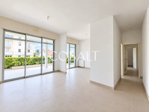 Appartement - 98 m2 - 3 chambres - Rez-de-jardin - double ga