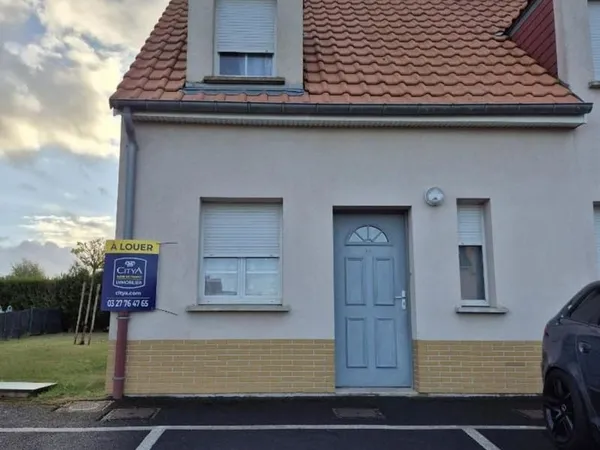 Maison située en résidence avec 2 chambres et jardin