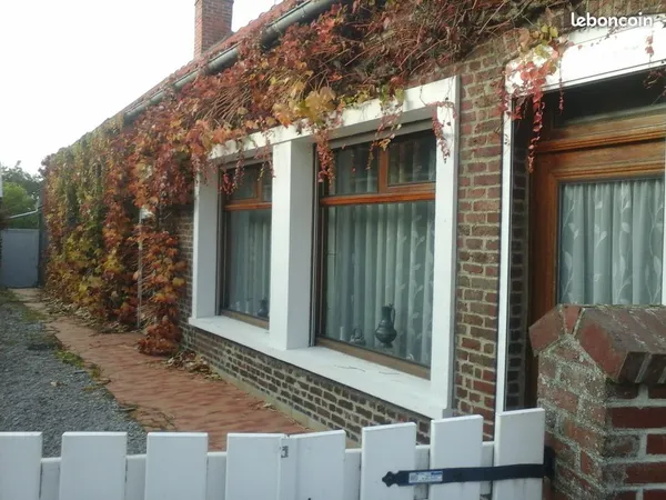 Maison au coeur du village avec cour,jardin,garage,dépendance