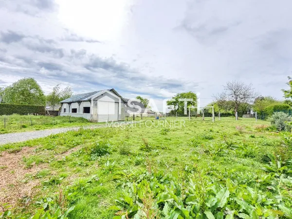 Grand terrain constructible de 2400m² en campagne