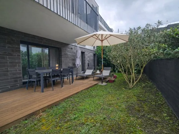 Appartement 3 chambres dans copropriété de 2018 - 2 places de stationnement en sous-sol