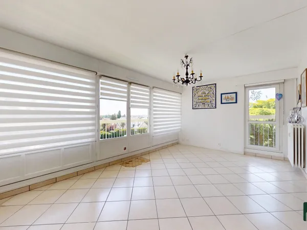 Appartement T4 avec balcon, cave et parking