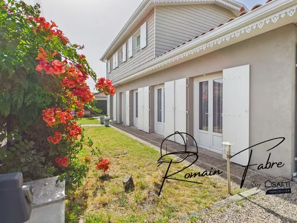 Maison familiale avec 6 chambres en double habitation dans un quartier calme