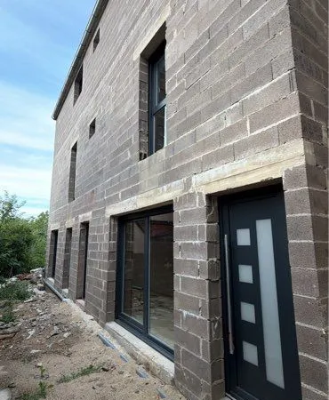 Immeuble de rapport avec 4 logements + terrain constructible de 650m2
