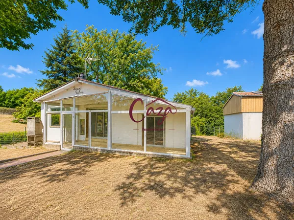 Maison au calme dans un environnement verdoyant