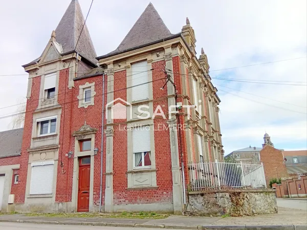 Maison de maître aux beaux volumes à conforter