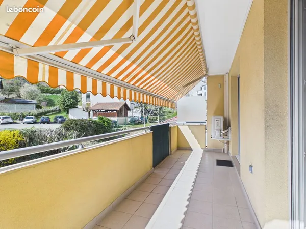 T2 meublé 45 m² - Balcon 10 m² - Box 14 m² - DPE C - Gare à pied