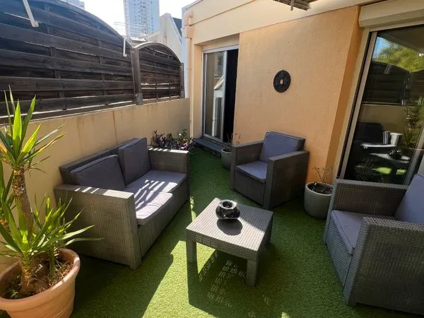 Bel appartement T3 avec terrasse, garage et climatisation