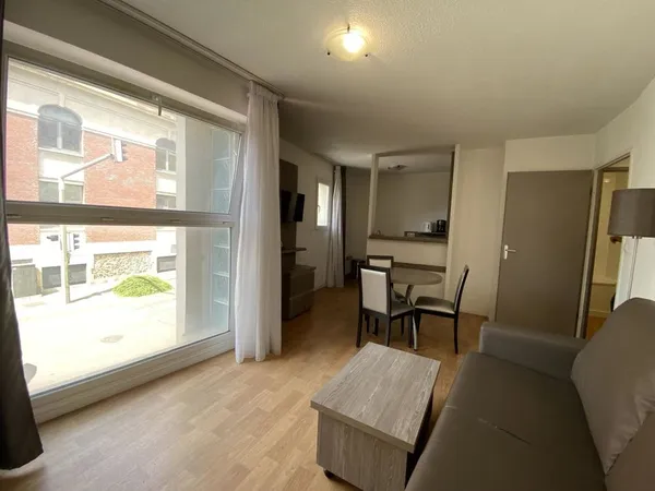 7 appartements (3 studios, 2 T1 et 2 T2) + 4 parkings