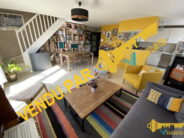 Appartement 94m2 - 4ch. + balcon - 2 parkings privés