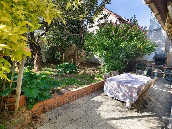 Vends maison avec jardin
