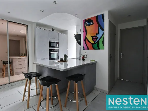 Appartement Décines-Charpieu 3 pièces d'environ 55 m2 au sein d'une résidence sécurisée avec une jol