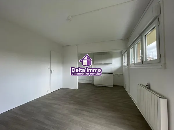 Appartement de type 2 en rdc avec jardin et cave