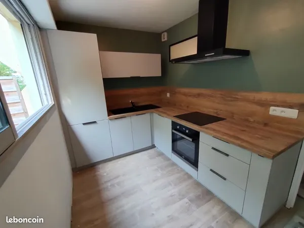 APPARTEMENT T1 bis 31m2 + TERRASSE + GARAGE box RUE DU TRIOLET - Calme en retrait de la rue - RDC - 