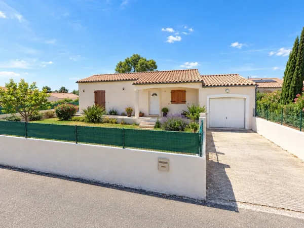 Maison de plain pied avec terrasse et jardin à NEFFIES (34)