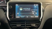 Peugeot 208 1.2 PureTech 82ch E6.2 Evap Active 5p — photo 29