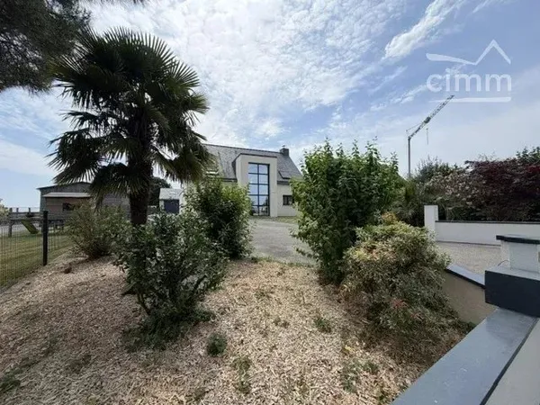 Maison 160 m² avec double garage de 100 m²