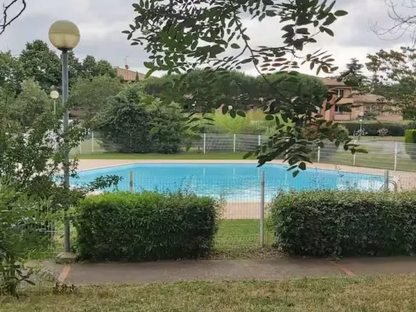 Les Muses = Studio climatisé avec piscine, jardin et parking