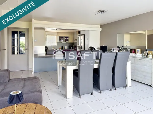 Maison 104 m², 4 chambres, garage et parking