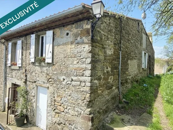 Ravissante maison en pierre d'environ 100m² entièrement rénovée avec une jolie cour intimiste