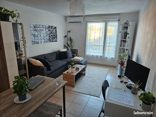 Appartement avec balcon 40m2 climatisé avec deux places de parking dont une en souterrain
