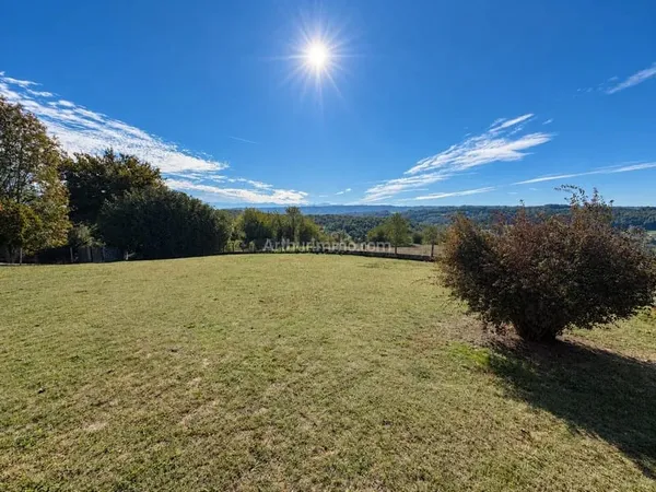 SERMÉRIEU - TERRAIN À BÂTIR DE 1 153 m² - ENVIRONNEMENT CALME