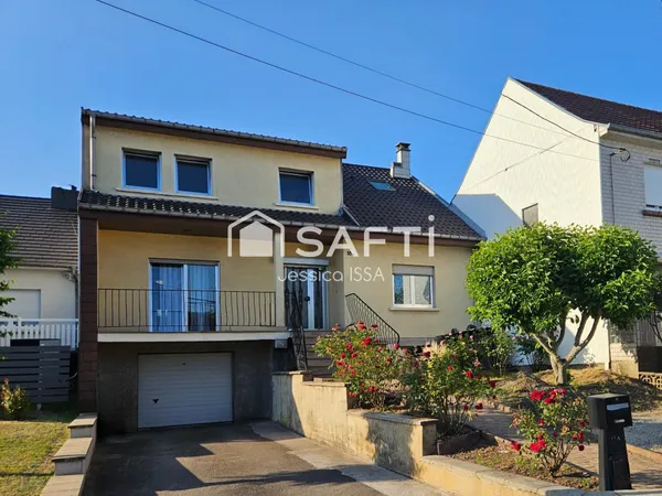 Maison familiale avec jardin et grand garage